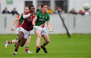 5 August 2013; Liam Irwin, Mayo, in action against Israel Ilunga, Westmeath. Electric Ireland GAA Football All-Ireland Minor Championship Quarter-Final, Mayo v Westmeath, O'Connor Park, Tullamore, Co. Offaly. Picture credit: David Maher / SPORTSFILE