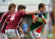 5 August 2013; Michael Plunkett, Mayo, in action against Liam Beddows, Westmeath. Electric Ireland GAA Football All-Ireland Minor Championship Quarter-Final, Mayo v Westmeath, O'Connor Park, Tullamore, Co. Offaly. Picture credit: David Maher / SPORTSFILE