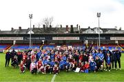 13 April 2022; St Patrick's Athletic players pose for a photo with Easter Camp attendees during a meet and greet after an open training session at Richmond Park in Dublin. Photo by David Fitzgerald/Sportsfile