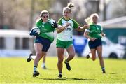3 April 2022; Rebecca Delee of Limerick and Emma Maher of Offaly during the Lidl Ladies Football National League Division 4 Final match between Limerick and Offaly at St Brendan's Park in Birr, Offaly. Photo by Ben McShane/Sportsfile