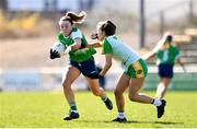 3 April 2022; Cathy Mee of Limerick and Róisín Ennis of Offaly during the Lidl Ladies Football National League Division 4 Final match between Limerick and Offaly at St Brendan's Park in Birr, Offaly. Photo by Ben McShane/Sportsfile