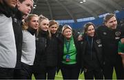 12 April 2022; Republic of Ireland players and staff, from left, Heather Payne, Ellen Molloy, Isibeal Atkinson, team doctor Siobhan Forman, Evelyn McMullan, FAI Team operations, physiotherapist Kathryn Fahy and assistant manager Tom Elms after the FIFA Women's World Cup 2023 qualifying match between Sweden and Republic of Ireland at Gamla Ullevi in Gothenburg, Sweden. Photo by Stephen McCarthy/Sportsfile
