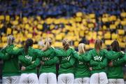 12 April 2022; Republic of Ireland players stand for the playing of the National Anthem as supporers hold card in the colours of Ukraine before the FIFA Women's World Cup 2023 qualifying match between Sweden and Republic of Ireland at Gamla Ullevi in Gothenburg, Sweden. Photo by Stephen McCarthy/Sportsfile