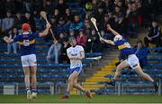13 April 2022; Joe Booth of Waterford is charged down by John Campion of Tipperary during the 2022 oneills.com Munster GAA Hurling Under 20 Championship Group 2 Round 2 match between Tipperary and Waterford at FBD Semple Stadium in Thurles, Tipperary. Photo by Seb Daly/Sportsfile
