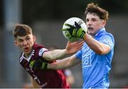 14 April 2022; Luke Breathnach of Dublin in action against Sam Smyth of Westmeath during the EirGrid Leinster GAA Under 20 Football Championship Quarter-Final match between Dublin and Westmeath at Parnell Park in Dublin. Photo by Harry Murphy/Sportsfile