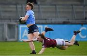 14 April 2022; Tom Brennan of Dublin in action against Adam Treanor of Westmeath during the EirGrid Leinster GAA Under 20 Football Championship Quarter-Final match between Dublin and Westmeath at Parnell Park in Dublin. Photo by Harry Murphy/Sportsfile