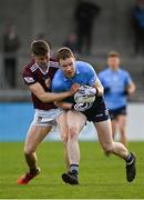 14 April 2022; Senan Forker of Dublin in action against Sam Smyth of Westmeath during the EirGrid Leinster GAA Under 20 Football Championship Quarter-Final match between Dublin and Westmeath at Parnell Park in Dublin. Photo by Harry Murphy/Sportsfile