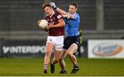14 April 2022; Ben McGauran of Westmeath is tackled by Senan Forker of Dublin during the EirGrid Leinster GAA Under 20 Football Championship Quarter-Final match between Dublin and Westmeath at Parnell Park in Dublin. Photo by Harry Murphy/Sportsfile