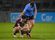 14 April 2022; Matthew Whittaker of Westmeath is consoled by Fionn Murray of Dublin after the EirGrid Leinster GAA Under 20 Football Championship Quarter-Final match between Dublin and Westmeath at Parnell Park in Dublin. Photo by Harry Murphy/Sportsfile