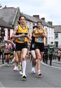 14 April 2022; Dympns Ryan, left, from Dundrum AC with eventual winner of the ladies race Lizzie Lee, right, from Leevale AC Co Cork in action during the Kia Race Series in Kilkenny. Photo by Matt Browne/Sportsfile