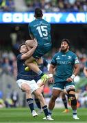 15 April 2022; Tiernan O'Halloran of Connacht is tackled by Hugo Keenan of Leinster during the Heineken Champions Cup Round of 16 Second Leg match between Leinster and Connacht at Aviva Stadium in Dublin. Photo by Brendan Moran/Sportsfile