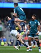 15 April 2022; Tiernan O'Halloran of Connacht is tackled by Hugo Keenan of Leinster during the Heineken Champions Cup Round of 16 Second Leg match between Leinster and Connacht at Aviva Stadium in Dublin. Photo by Brendan Moran/Sportsfile