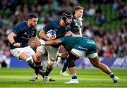 15 April 2022; Caelan Doris of Leinster is tackled by Bundee Aki of Connacht during the Heineken Champions Cup Round of 16 Second Leg match between Leinster and Connacht at Aviva Stadium in Dublin. Photo by Harry Murphy/Sportsfile