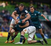 15 April 2022; Jack Carty of Connacht is tackled by Ross Molony and Caelan Doris of Leinster during the Heineken Champions Cup Round of 16 Second Leg match between Leinster and Connacht at Aviva Stadium in Dublin. Photo by Brendan Moran/Sportsfile