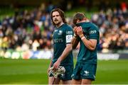 15 April 2022; John Porch and Mack Hansen of Connacht after their side's defeat in the Heineken Champions Cup Round of 16 Second Leg match between Leinster and Connacht at Aviva Stadium in Dublin. Photo by Harry Murphy/Sportsfile