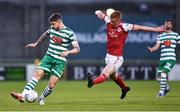 15 April 2022; Lee Grace of Shamrock Rovers in action against Eoin Doyle of St Patrick's Athletic during the SSE Airtricity League Premier Division match between Shamrock Rovers and St Patrick's Athletic at Tallaght Stadium in Dublin. Photo by Ben McShane/Sportsfile