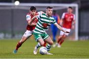 15 April 2022; Jack Byrne of Shamrock Rovers in action against Adam O'Reilly of St Patrick's Athletic during the SSE Airtricity League Premier Division match between Shamrock Rovers and St Patrick's Athletic at Tallaght Stadium in Dublin. Photo by Ben McShane/Sportsfile