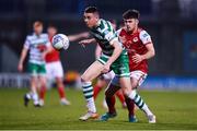 15 April 2022; Gary O'Neill of Shamrock Rovers in action against Adam O'Reilly of St Patrick's Athletic during the SSE Airtricity League Premier Division match between Shamrock Rovers and St Patrick's Athletic at Tallaght Stadium in Dublin. Photo by Ben McShane/Sportsfile