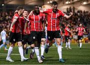 15 April 2022; James Akintunde of Derry City celebrates after scoring his side's first goal with team-mates, including Will Patching, right, during the SSE Airtricity League Premier Division match between Derry City and Shelbourne at The Ryan McBride Brandywell Stadium in Derry. Photo by Stephen McCarthy/Sportsfile