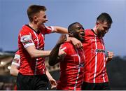 15 April 2022; James Akintunde of Derry City celebrates after scoring his side's first goal with team-mates, including Brandon Kavanagh, left, and Will Patching, right, during the SSE Airtricity League Premier Division match between Derry City and Shelbourne at The Ryan McBride Brandywell Stadium in Derry. Photo by Stephen McCarthy/Sportsfile