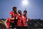 15 April 2022; James Akintunde of Derry City celebrates after scoring his side's first goal with team-mates, including Brandon Kavanagh, left, and Will Patching, right, during the SSE Airtricity League Premier Division match between Derry City and Shelbourne at The Ryan McBride Brandywell Stadium in Derry. Photo by Stephen McCarthy/Sportsfile