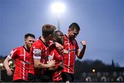 15 April 2022; James Akintunde, second from right, of Derry City celebrates after scoring his side's first goal with team-mates, from left, Cameron McJannet, Brandon Kavanagh and Will Patching during the SSE Airtricity League Premier Division match between Derry City and Shelbourne at The Ryan McBride Brandywell Stadium in Derry. Photo by Stephen McCarthy/Sportsfile