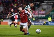15 April 2022; Darragh Burns of St Patrick's Athletic is fouled by Ronan Finn of Shamrock Rovers during the SSE Airtricity League Premier Division match between Shamrock Rovers and St Patrick's Athletic at Tallaght Stadium in Dublin. Photo by Ben McShane/Sportsfile