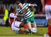 15 April 2022; Gary O'Neill of Shamrock Rovers is tackled by Tunde Owolabi of St Patrick's Athletic during the SSE Airtricity League Premier Division match between Shamrock Rovers and St Patrick's Athletic at Tallaght Stadium in Dublin. Photo by Ben McShane/Sportsfile