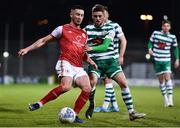 15 April 2022; Ronan Coughlan of St Patrick's Athletic in action against Dylan Watts of Shamrock Rovers during the SSE Airtricity League Premier Division match between Shamrock Rovers and St Patrick's Athletic at Tallaght Stadium in Dublin. Photo by Ben McShane/Sportsfile