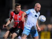 15 April 2022; Mark Coyle of Shelbourne in action against Joe Thomson of Derry City during the SSE Airtricity League Premier Division match between Derry City and Shelbourne at The Ryan McBride Brandywell Stadium in Derry. Photo by Stephen McCarthy/Sportsfile