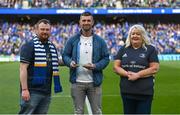 15 April 2022; Former Leinster player Rob Kearney is presented a trophy by members of the OLSC Eoin Kilkenny and Mary Carroll during the Heineken Champions Cup Round of 16 Second Leg match between Leinster and Connacht at Aviva Stadium in Dublin. Photo by Harry Murphy/Sportsfile