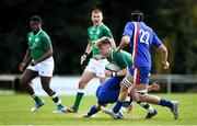 16 April 2022; James Wright of Ireland is tackled by Liam Rimet of France during the U19 Rugby International match between Ireland and France at Templeville Road in Dublin. Photo by Eóin Noonan/Sportsfile