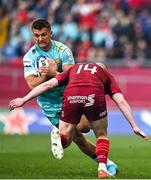 16 April 2022; Henry Slade of Exeter Chiefs is tackled by Keith Earls of Munster during the Heineken Champions Cup Round of 16 Second Leg match between Munster and Exeter Chiefs at Thomond Park in Limerick. Photo by Brendan Moran/Sportsfile