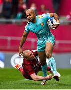 16 April 2022; Tom O'Flaherty of Exeter Chiefs beats the tackles of  Keith Earls of Munster during the Heineken Champions Cup Round of 16 Second Leg match between Munster and Exeter Chiefs at Thomond Park in Limerick. Photo by Brendan Moran/Sportsfile