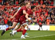 16 April 2022; Joey Carbery of Munster celebrates with teammate Mike Haley after scoring his side's first try during the Heineken Champions Cup Round of 16 Second Leg match between Munster and Exeter Chiefs at Thomond Park in Limerick. Photo by Harry Murphy/Sportsfile