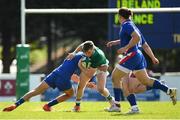 16 April 2022; Liam McCarthy of Ireland is tackled by Nicolas Depoortere of France during the U19 Rugby International match between Ireland and France at Templeville Road in Dublin. Photo by Eóin Noonan/Sportsfile