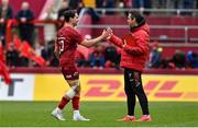 16 April 2022; Munster head coach Johann van Graan and Joey Carbery celebrate after the Heineken Champions Cup Round of 16 Second Leg match between Munster and Exeter Chiefs at Thomond Park in Limerick. Photo by Brendan Moran/Sportsfile