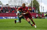 16 April 2022; Simon Zebo of Munster offloads in the lead up to his side's second try during the Heineken Champions Cup Round of 16 Second Leg match between Munster and Exeter Chiefs at Thomond Park in Limerick. Photo by Brendan Moran/Sportsfile