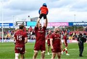 16 April 2022; Jack O'Donoghue of Munster throws Frank Haley, son of Mike Haley, in the air after his side's victory in the Heineken Champions Cup Round of 16 Second Leg match between Munster and Exeter Chiefs at Thomond Park in Limerick. Photo by Harry Murphy/Sportsfile