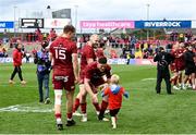 16 April 2022; Jack O'Donoghue of Munster celebrates with Frank Haley, son of Mike Haley, left, during the Heineken Champions Cup Round of 16 Second Leg match between Munster and Exeter Chiefs at Thomond Park in Limerick. Photo by Harry Murphy/Sportsfile