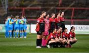 16 April 2022; Bohemians pose for a photograph as DLR players huddle before the SSE Airtricity Women's National League match between Bohemians and DLR Waves at Dalymount Park in Dublin. Photo by Ben McShane/Sportsfile
