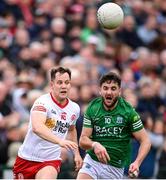16 April 2022; Kieran McGeary of Tyrone in action against Ryan Lyons of Fermanagh during the Ulster GAA Football Senior Championship preliminary round match between Fermanagh and Tyrone at Brewster Park in Enniskillen, Fermanagh. Photo by Stephen McCarthy/Sportsfile