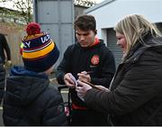16 April 2022; Antoine Dupont of Toulouse signs an autograph for Charlie Benson, age 12, from Belfast before the Heineken Champions Cup Round of 16 Second Leg match between Ulster and Toulouse at Kingspan Stadium in Belfast. Photo by David Fitzgerald/Sportsfile