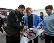 16 April 2022; Julien Marchand of Toulouse signs an Ulster flag for Matthew, age 12, left, and James Laird, age 15, from Limavady before the Heineken Champions Cup Round of 16 Second Leg match between Ulster and Toulouse at Kingspan Stadium in Belfast. Photo by David Fitzgerald/Sportsfile