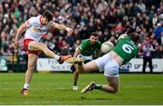 16 April 2022; Conor McKenna of Tyrone has a shot on goal blocked by Richard O'Callaghan of Fermanagh during the Ulster GAA Football Senior Championship preliminary round match between Fermanagh and Tyrone at Brewster Park in Enniskillen, Fermanagh. Photo by Stephen McCarthy/Sportsfile