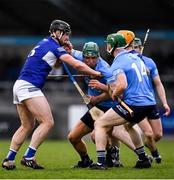 16 April 2022; Chris Crummey of Dublin is tackled by Liam O'Connell of Laois during the Leinster GAA Hurling Senior Championship Round 1 match between Dublin and Laois at Parnell Park in Dublin. Photo by Eóin Noonan/Sportsfile