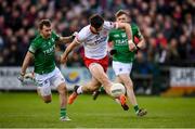 16 April 2022; Conor McKenna of Tyrone in action against Declan McClusker of Fermanagh during the Ulster GAA Football Senior Championship preliminary round match between Fermanagh and Tyrone at Brewster Park in Enniskillen, Fermanagh. Photo by Stephen McCarthy/Sportsfile