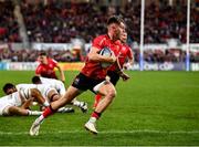 16 April 2022; Ethan McIlroy of Ulster on his way to scoring his side's first try during the Heineken Champions Cup Round of 16 Second Leg match between Ulster and Toulouse at Kingspan Stadium in Belfast. Photo by David Fitzgerald/Sportsfile