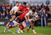 16 April 2022; Tim Nanai-Williams of Toulouse is tackled by James Hume and Robert Baloucoune of Ulster during the Heineken Champions Cup Round of 16 Second Leg match between Ulster and Toulouse at Kingspan Stadium in Belfast. Photo by Ramsey Cardy/Sportsfile