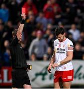 16 April 2022; Conor McKenna of Tyrone is shown a red card by referee Joe McQuillan during the Ulster GAA Football Senior Championship preliminary round match between Fermanagh and Tyrone at Brewster Park in Enniskillen, Fermanagh. Photo by Stephen McCarthy/Sportsfile